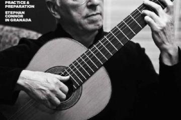 CG Magazine cover with black and white photo of John Williams playing a nylon-string guitar