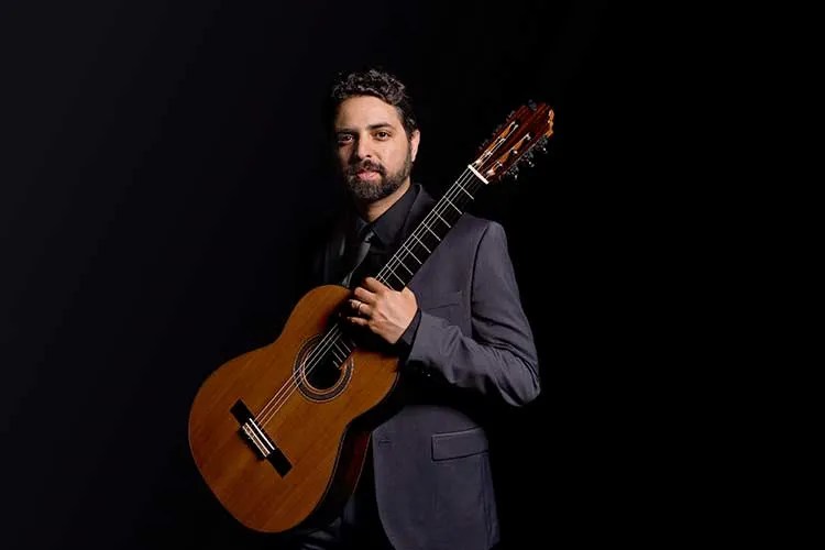 Chris Mallet with guitar