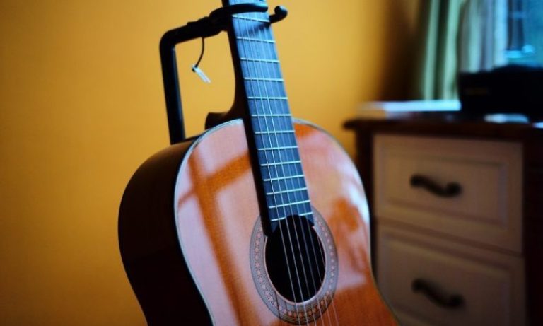 classical guitar on stand