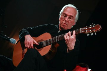 John Williams playing guitar
