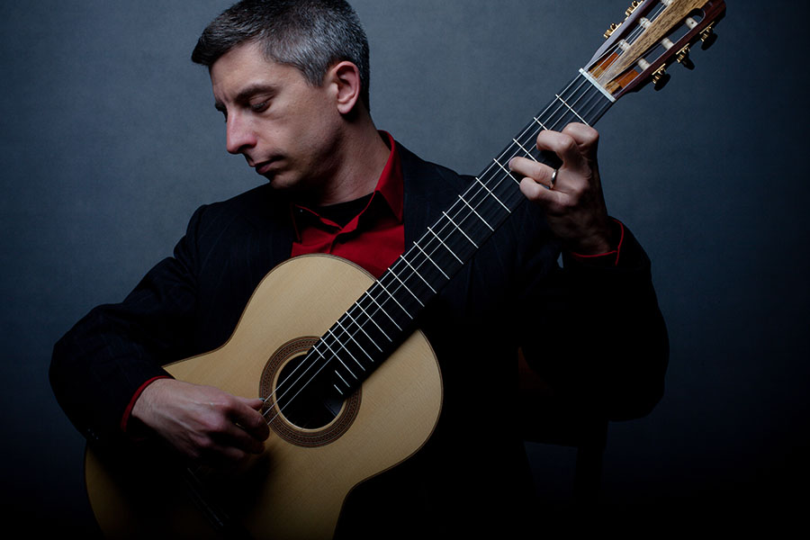 Kevin-J-Cope-playing-Douglass-Scott-Guitar-credit-Brian-Mengini