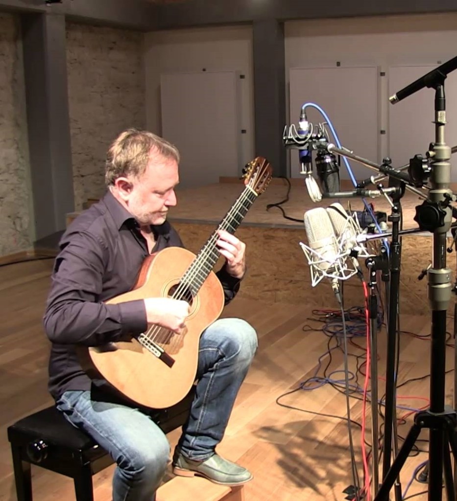 Guitarist/engineer Jan Zacek conducts a microphone test with models from Neumann, Schoeps, and B&K at Acustica Studio in Germany.