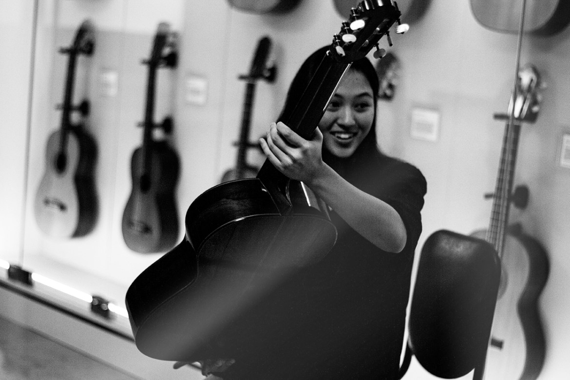SFCM student Nathania Isnandar enjoys trying out the Hauser II during a Harris Collection Wednesday session