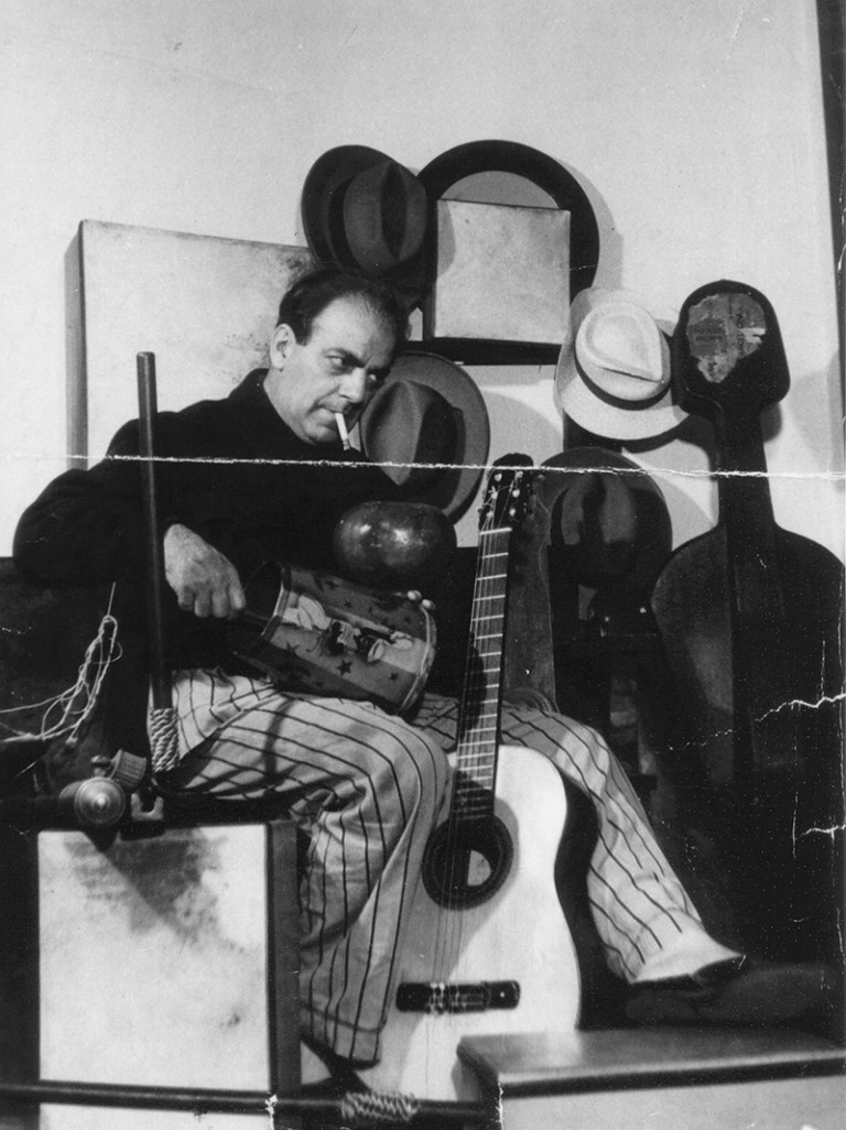 Composer and classical guitarist Heitor Villa-Lobos with guitar
